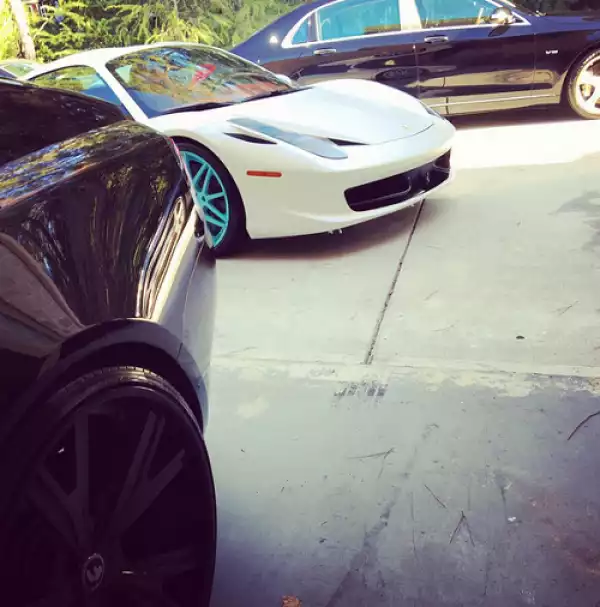 Rapper Rick Ross shows off his exotic garage